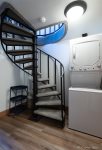 Spiral staircase to lower bedrooms